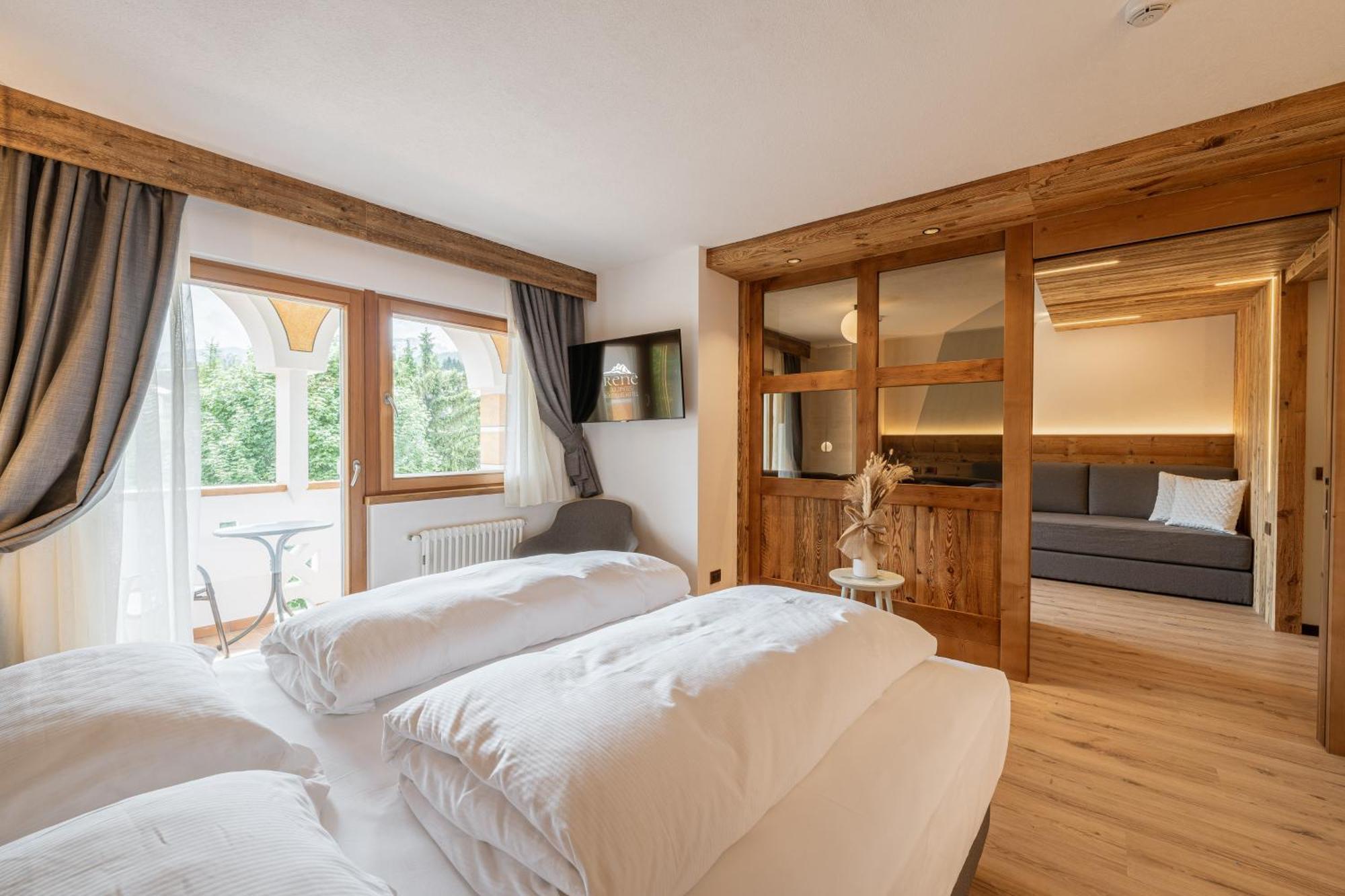 פוצה די פאסה Rene Dolomites Boutique Hotel מראה חיצוני תמונה