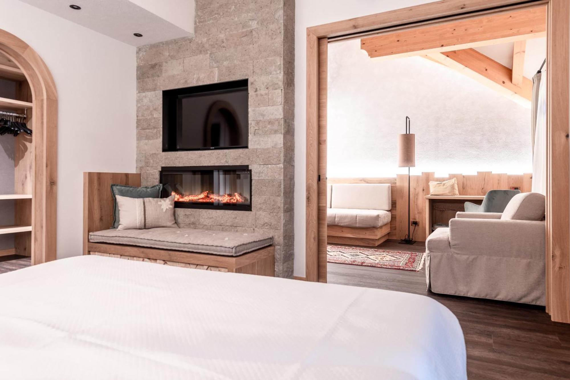 פוצה די פאסה Rene Dolomites Boutique Hotel מראה חיצוני תמונה